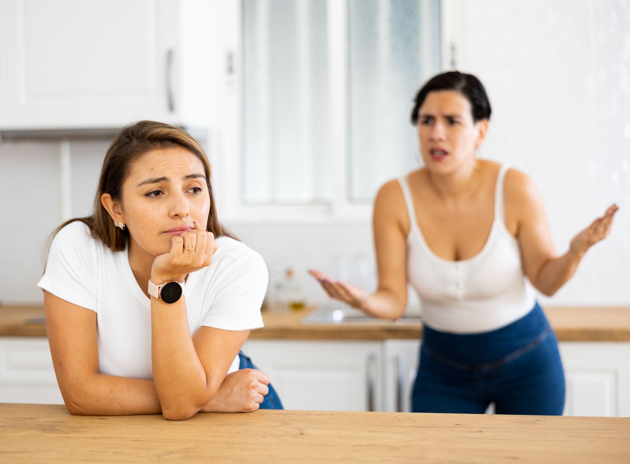 Parent and teen in a moment of conflict